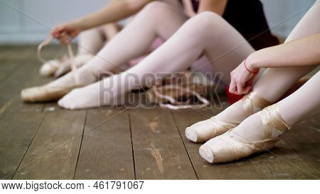 Close Up, Ballerinas Change Their Shoes Into Special Ballet Shoes, Pointe Shoes, Lace With Ballet Ri