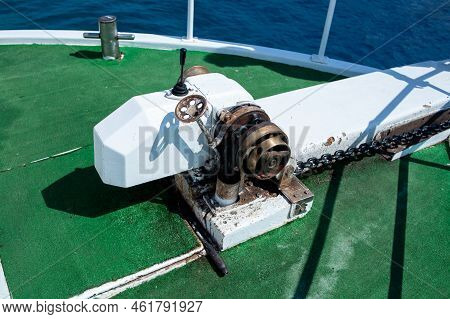 Anchor Lifting Mechanism Engine On The Boat. Anchor Chain Winch Mechanism.
