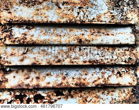 A Closeup Shot Of A Rusty Metal Surface. Corosion.