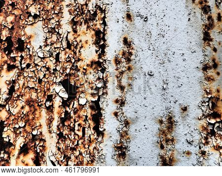 A Closeup Shot Of A Rusty Metal Surface. Corosion.