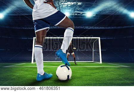 Soccer Scene At Night Match With Player Kicking The Penalty Kick