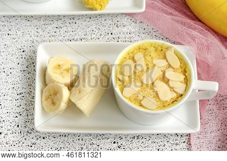 Mini Cake. Breakfast In A Mug. Homemade Portioned Banana Mugcake In Small Mugs.