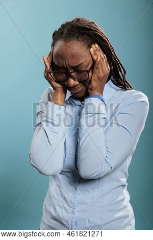 Stressed Young Adult Person With Hypertension Feeling Sick Because Of Headache. Unwell And Ill Woman