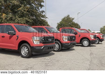 Ford F-150 Display At A Dealership. The Ford F150 Is Available In Xl, Xlt, Lariat, King Ranch, Plati