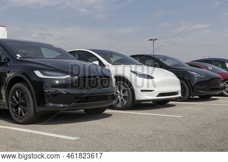 Tesla Ev Electric Vehicles On Display. Tesla Products Include Electric Cars, Battery Energy Storage