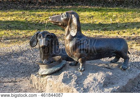Moscow Region, Russia - November 21, 2019: Monument To The Dachshunds.bronze Sculptural Composition 