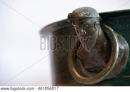 The Cauldron Is Decorated By Four Cast Heads Of Germanic Men Wearing A Suebian Knot Hairstyle That A
