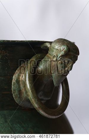 The Cauldron Is Decorated By Four Cast Heads Of Germanic Men Wearing A Suebian Knot Hairstyle That A