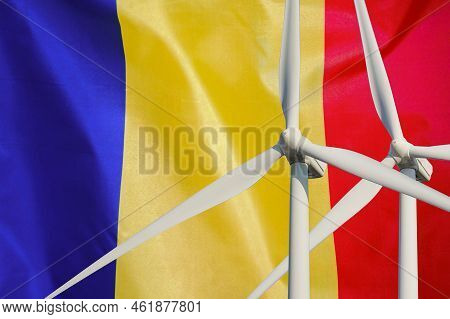 Two Wind Turbines For Alternative Energy On Moldavia Flag Background. Wind Turbines Generating Elect