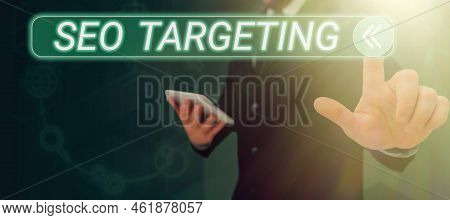 Hand Writing Sign Seo Targeting. Internet Concept Specific Keywords For Location Landing Page Top Do