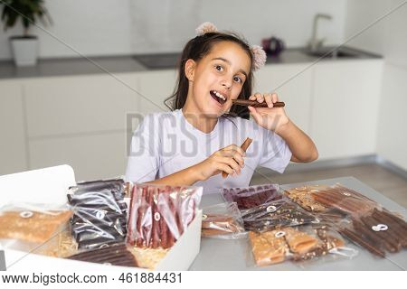 Little Girl With A Box Of Pastilles