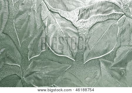 Grün getönte Glas mit Blatt Muster