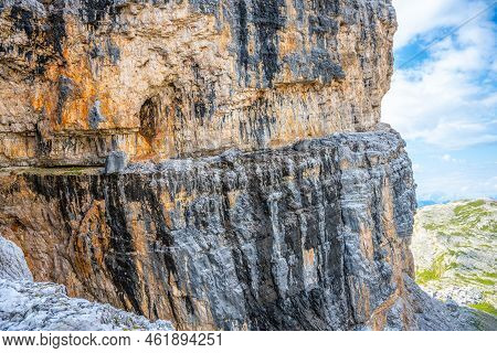 Via Ferrata Giovanni Lipella Traversing Vertical Wall Of Tofana Di Rozes Above Tavernanzes Valley In