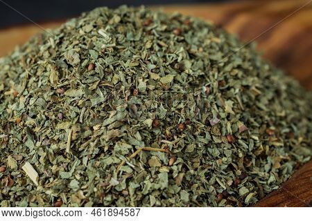 Dried Chopped Provence Herbs In A Wooden  Bowl