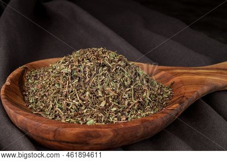 Dried Chopped Provence Herbs In A Wooden  Bowl