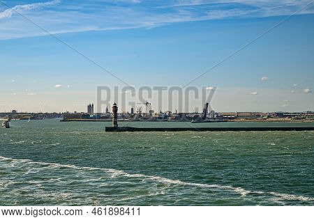 Europe, France, Dunkerque - July 9, 2022: Feu De Saint Pol Light Tower On Its Pier In Choppy North S