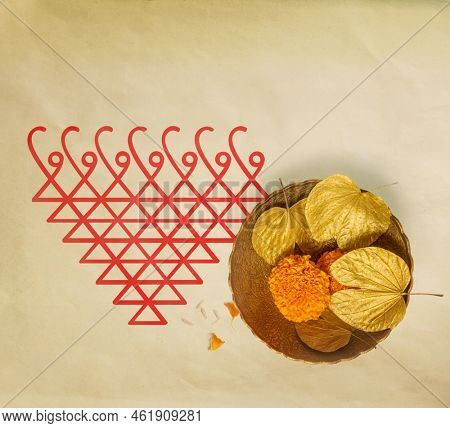 Dussehra background with 'Saraswati Yantra' drawn along with Sona leaves and flowers. Hindu festival Dashahara background template with Goddess Saraswati symbol.