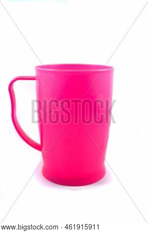 Pink Plastic Handle Cup Isolated On White Background.