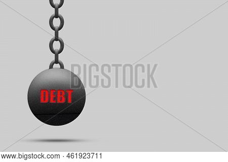 Kettlebell With A Chain, The Word Debt, On A Gray Background. Copy Space. The Severity Of Obligation