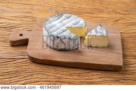 Brazilian Artisan Lua Cheia Cheese Over Wooden Table.