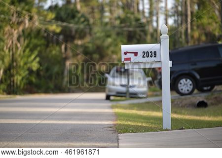 Typical American Outdoors Mail Box On Suburban Street Side.
