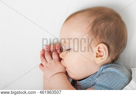 Baby Sleeps On Bed. Infant, Toddler Restful Sleep, Teething, Colic.