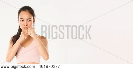 Sport, Wellbeing And Active Lifestyle Concept. Close-up Of Focused, Serious Asian Girl In Fitness Cl