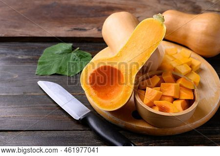 Butternut Squash Or Butternut Pumpkin On Wooden Background Prepare For Cooking
