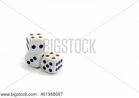 Three Plastic Dice Isolated On A White Background, A Dice Is A Small Object Generally In The Shape O