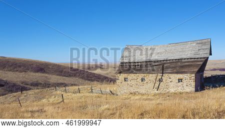 Old Ranch Building That Has Been Adandoned For Years And Is Decaying