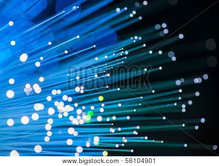bunch of optical fibres dinamic flying from deep on technology background