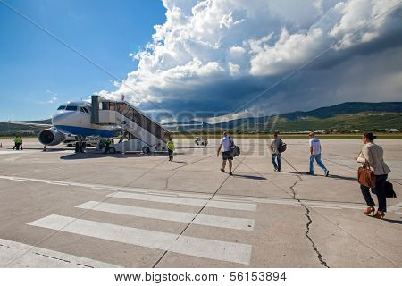 SPLIT, CROATIA - JUN 6: Croatia Airlines Airbus A319 parked on a runway of Split Airport during boarding on June 6, 2013 in Split, Croatia. Airport has very good connections to other European cities.
