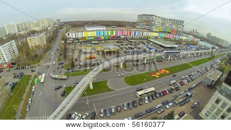 District with crossroads of highways and railway with electric train near the telecentre, view from unmanned quadrocopter.