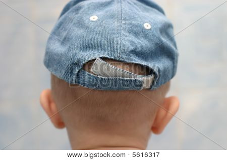 Bagsiden af barnets hoved og Cap