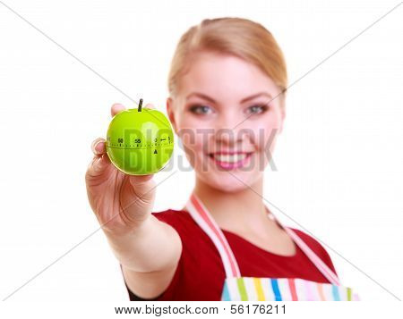 Happy Housewife Or Chef In Kitchen Apron Showing Apple Timer