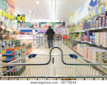 View From Shopping Cart Trolley At Supermarket Shop. Retail.