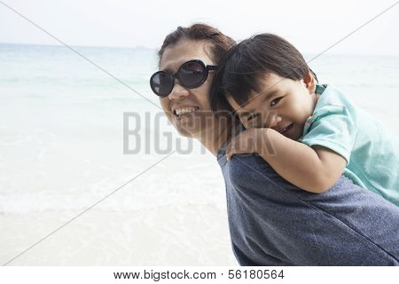 mother and kid relaxing emotion on sand beach use for good healthy lifestyle single mom and family t