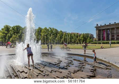 Berlin, Germany - July 22: Unknown People Seeking Refreshment At A Hot Summer Day At The Plaza 
