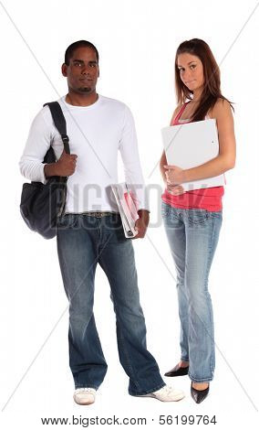 Two attractive students standing in front of plain white background.