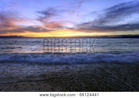 Ocean Sunset With Small Wave