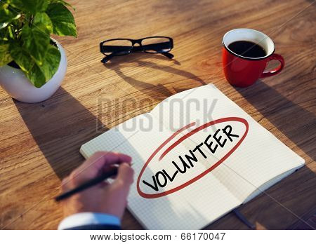 Man with Note Pad and Volunteer Concept