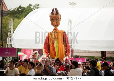 Actors Holding Puppets In Harmony World Puppet Carnival In Bangkok,Thailand 2014 Parade.