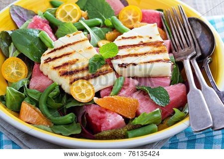 Salad with fresh watermelon and haloumi cheese