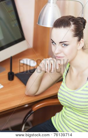 Young Female Retoucher At Work