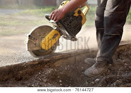 Construction Site, Worker Cut Asphalt With Saw Blade Toll