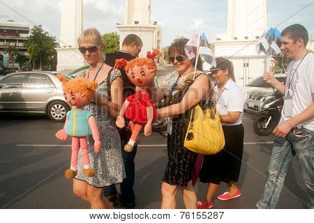 Actors Holding Puppets In Harmony World Puppet Carnival In Bangkok,Thailand 2014 Parade.