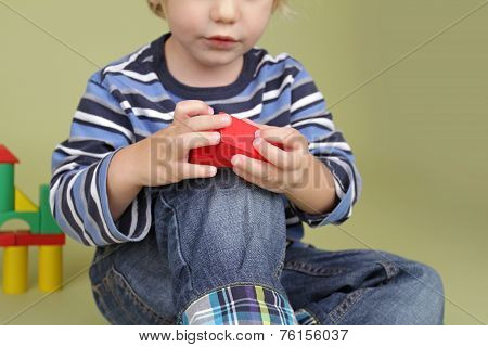 Child Playing With Blocks
