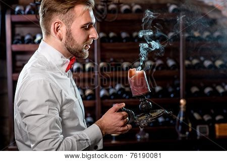 Sommelier in the wine cellar