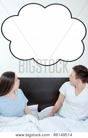 Couple Looking Up At Empty Copyspace Cloud