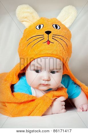 Cute baby boy in funny towel